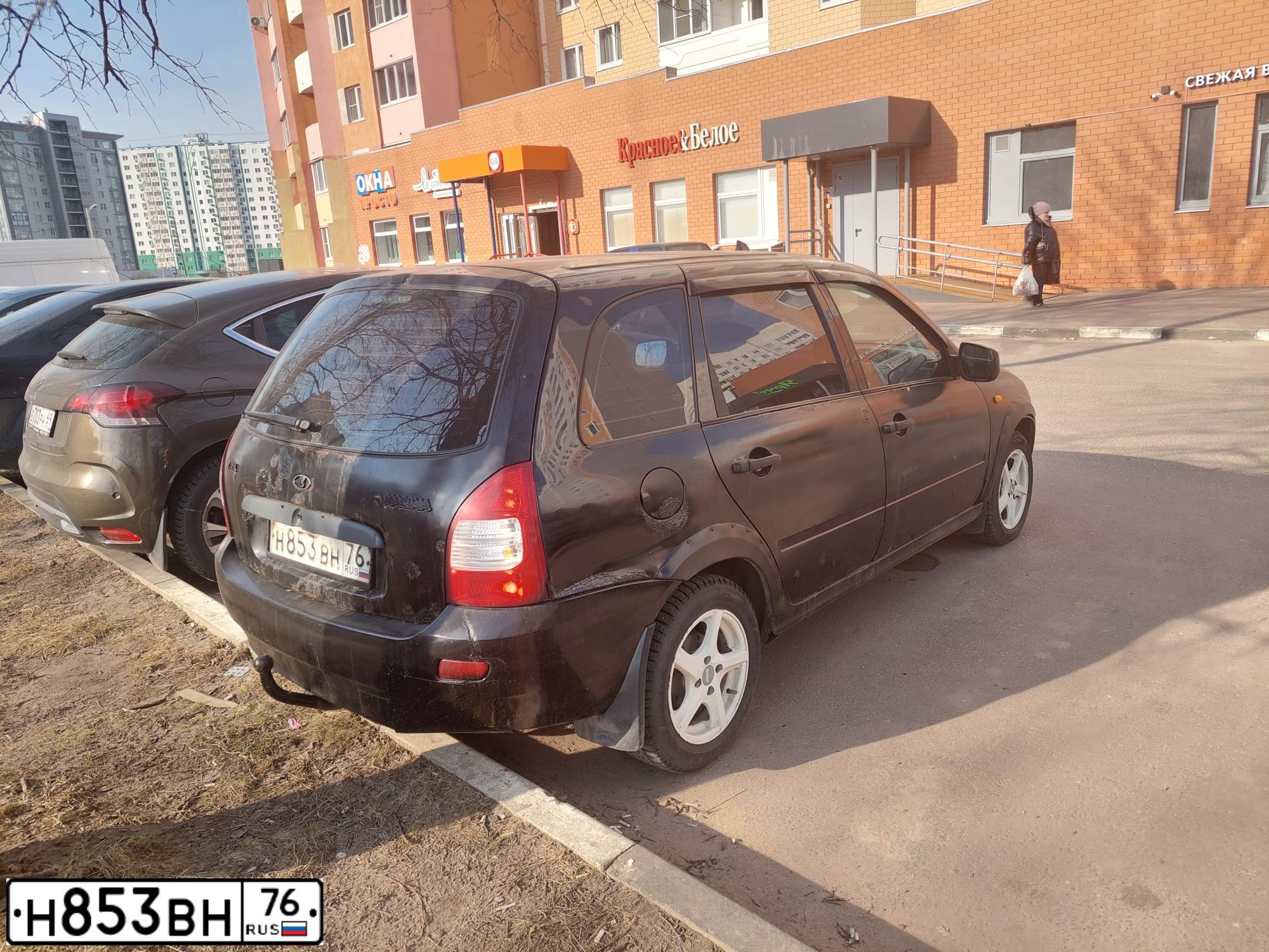 Фото автомобиля LADA 1117 KALINA, 2012 — госномер Н853ВН76. Цвет: Сине-Черный