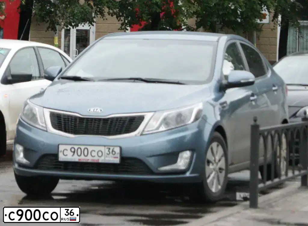 Фото автомобиля KIA RIO, 2012 — госномер С900СО36. Цвет: голубой