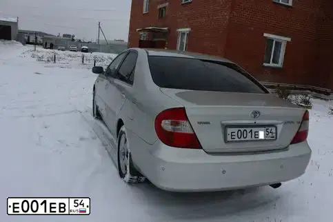 Фото автомобиля BMW X5, 2007 — госномер Е001ЕВ54. Цвет: СЕРЫЙ