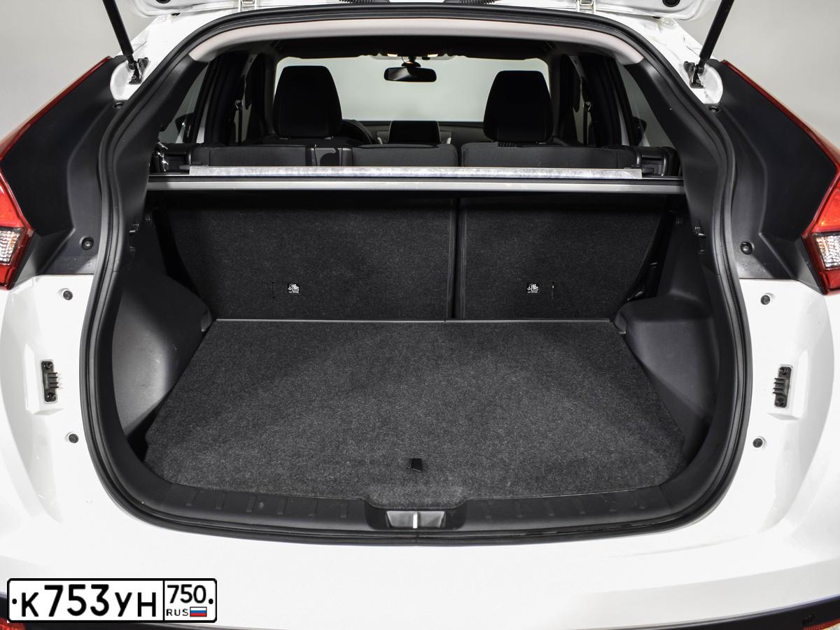 Фото автомобиля MITSUBISHI ECLIPSE CROSS, 2019 — госномер К181ХС799. Цвет: Белый