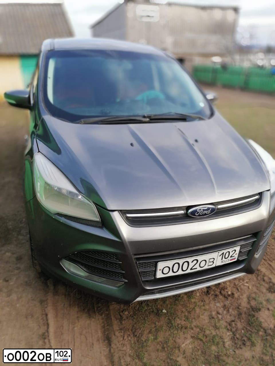Фото автомобиля FORD KUGA, 2013 — госномер Е121УР08. Цвет: СЕРЫЙ