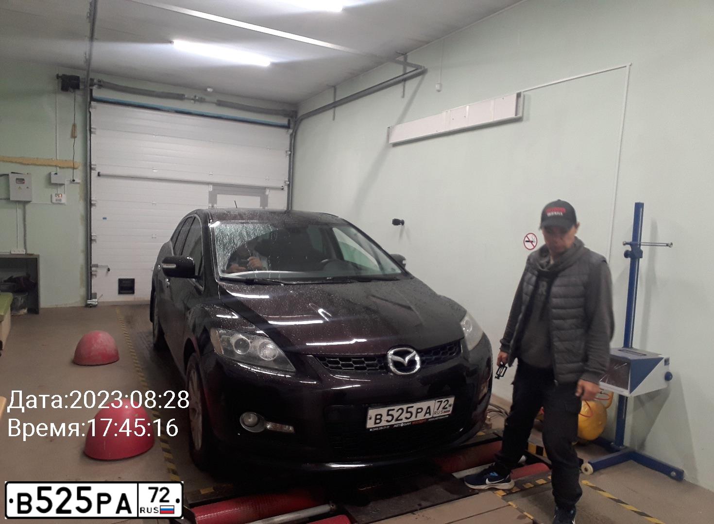 Фото автомобиля MAZDA CX-7, 2008 — госномер В525РА72. Цвет: ТЕМНО-ВИШНЕВЫЙ