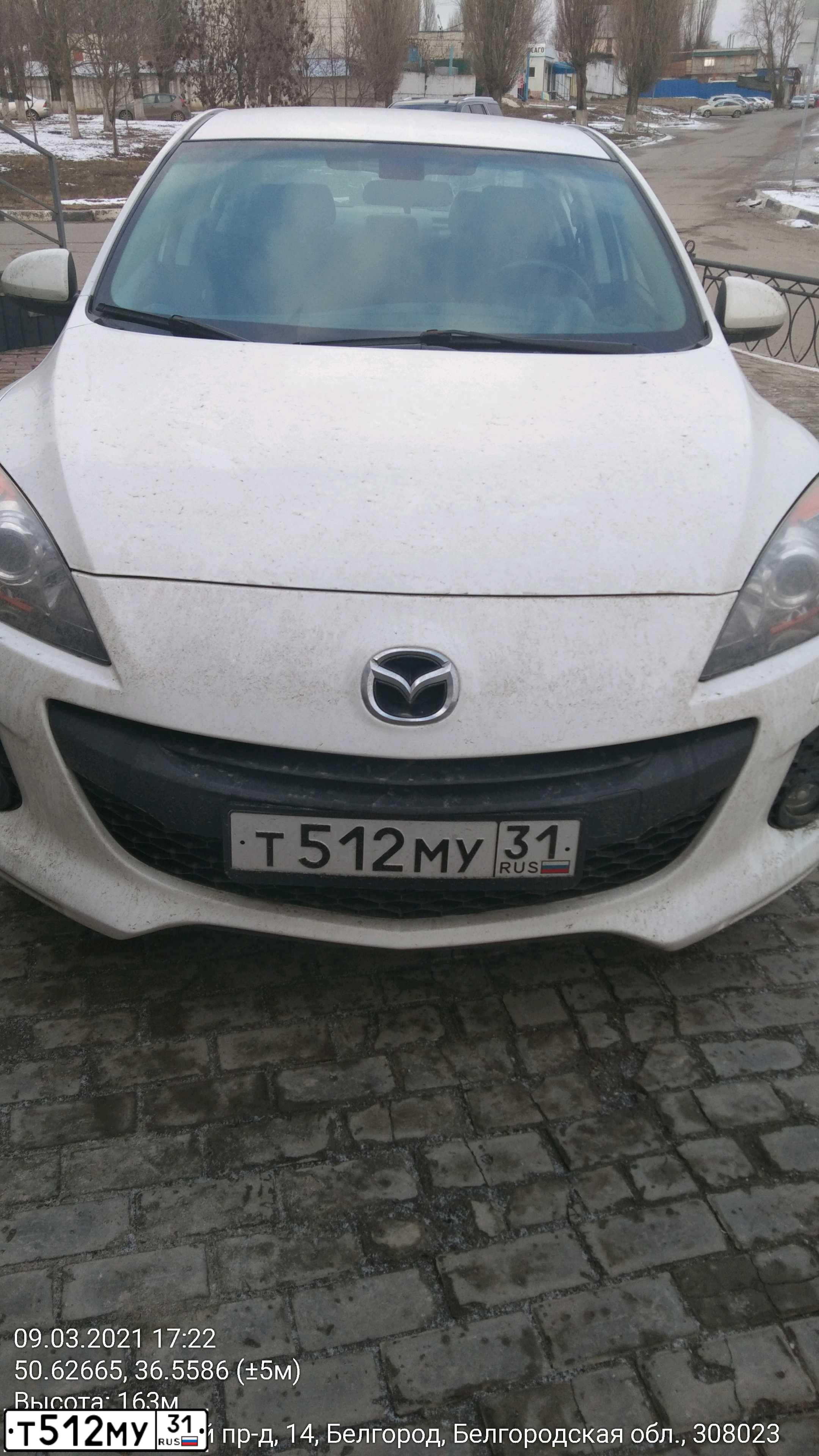 Фото автомобиля MAZDA 3, 2012 — госномер К007ВО31. Цвет: Белый