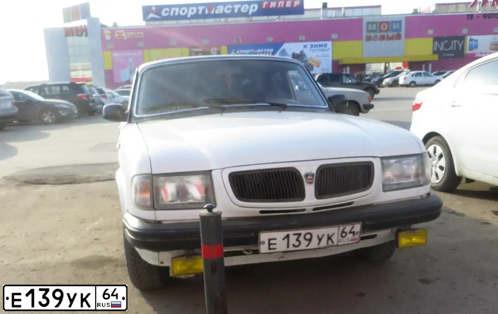 Фото автомобиля GAZ 3110 WOLGA, 1997 — госномер Е707НА64. Цвет: СЕРО-БЕЛЫЙ