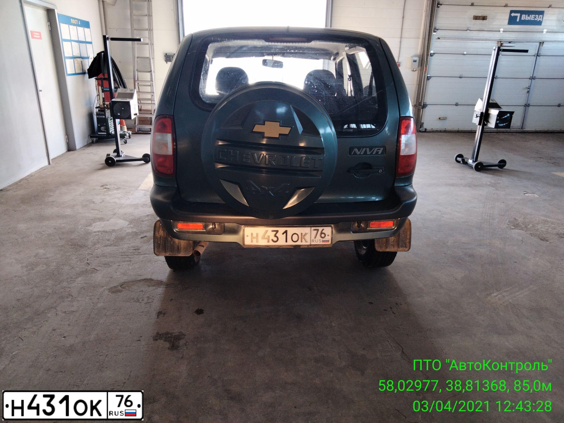 Фото автомобиля LADA 2131 NIVA, 2012 — госномер К464ВК29. Цвет: сине-зеленый