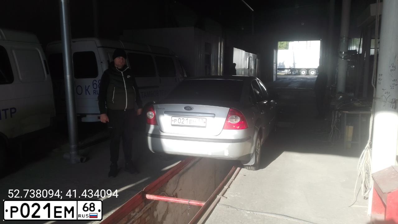 Фото автомобиля FORD FOCUS, 2006 — госномер Р021ЕМ68. Цвет: Серебристый