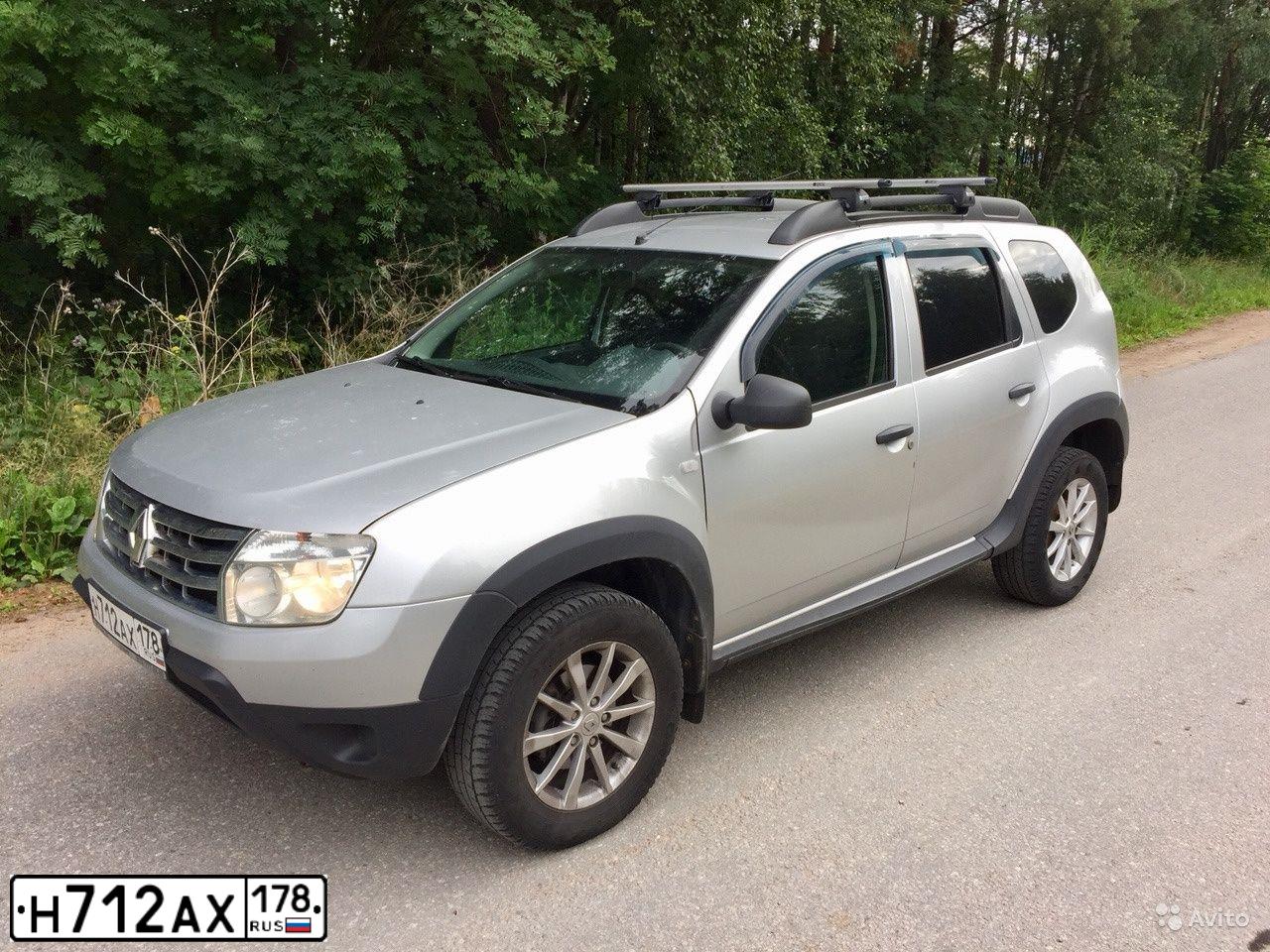 Фото автомобиля RENAULT DUSTER, 2012 — госномер Е260АС11. Цвет: СВЕТЛО-СЕРЫЙ