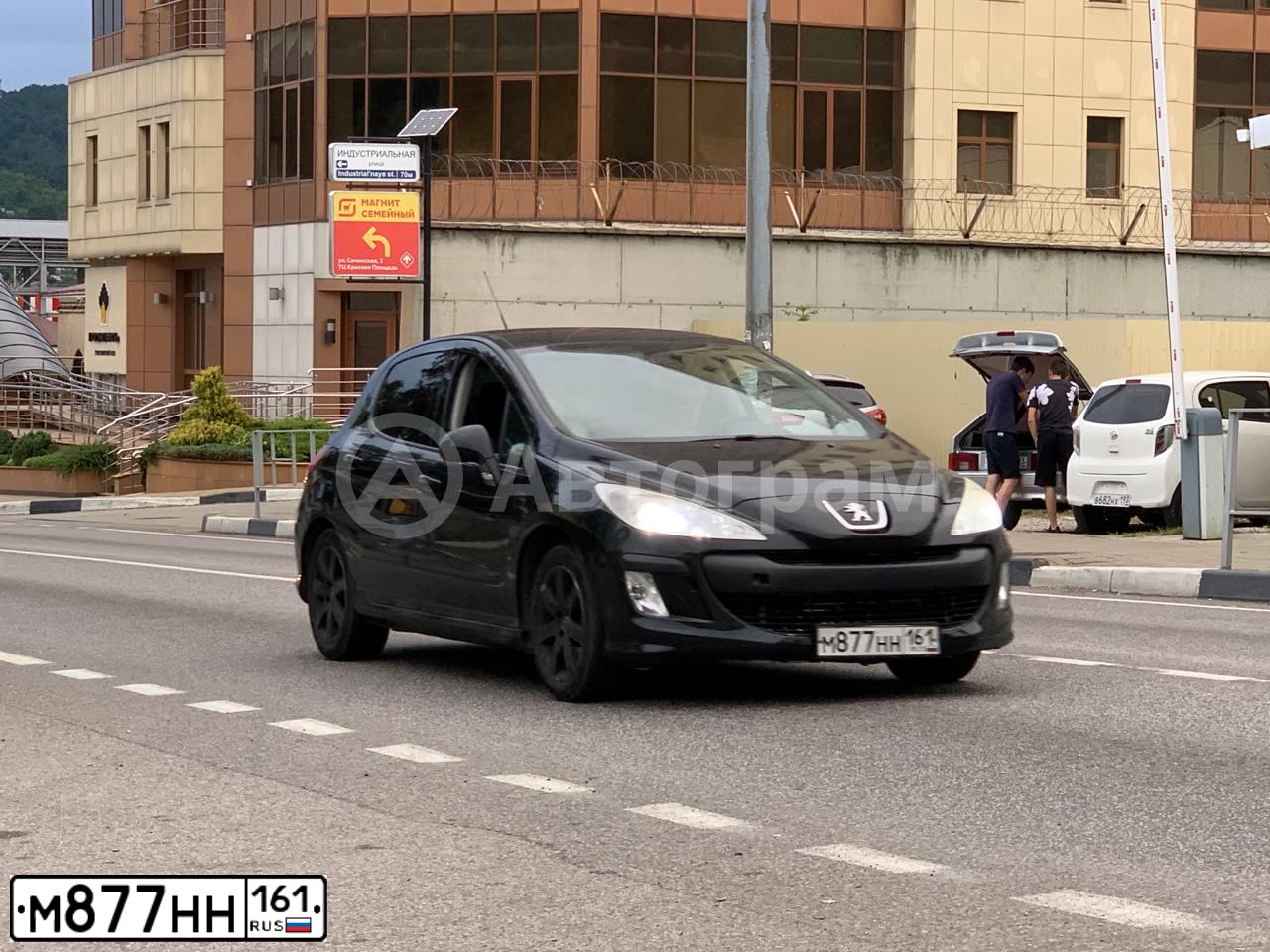 Фото автомобиля PEUGEOT 308, 2011 — госномер М877НН161. Цвет: ЧЕРНЫЙ