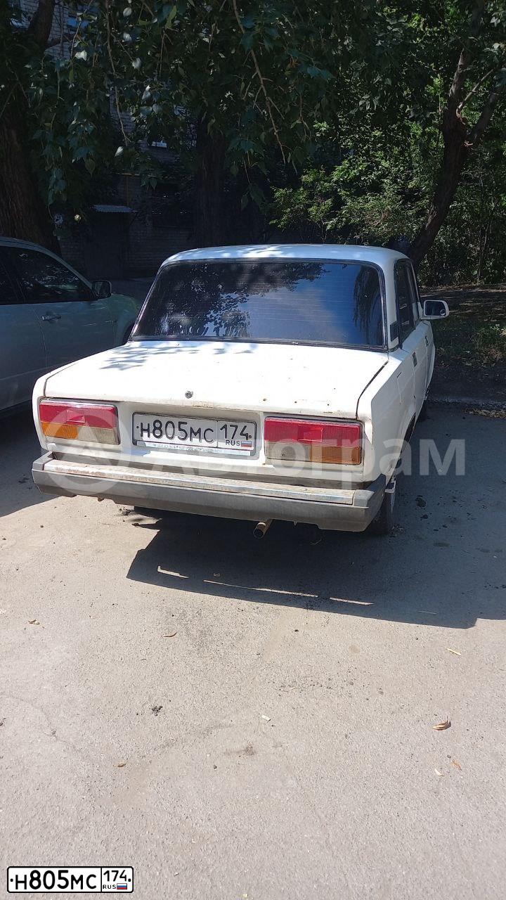 Фото автомобиля LADA 2107, 2007 — госномер Н805МС174. Цвет: ЯРКО-БЕЛЫЙ