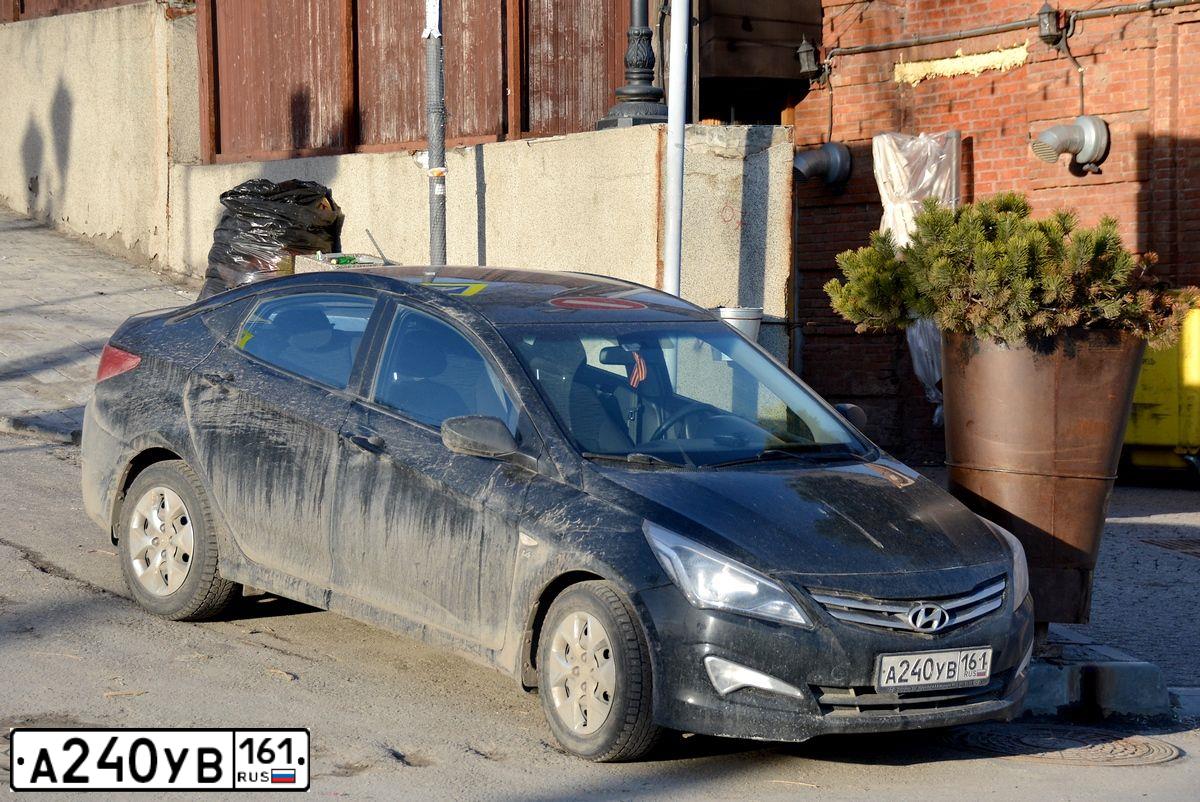 Фото автомобиля HYUNDAI SOLARIS, 2015 — госномер А240УВ161. Цвет: ЧЕРНЫЙ