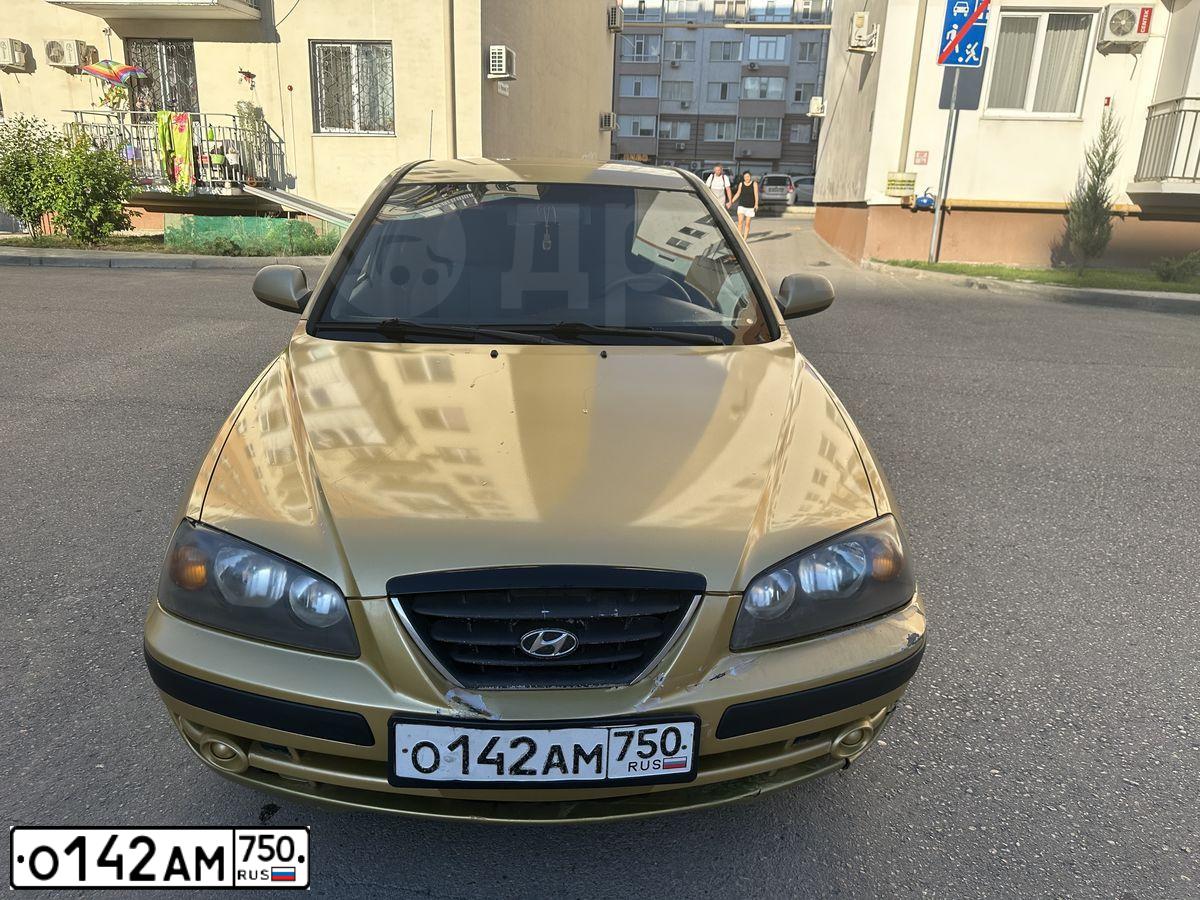 Фото автомобиля HYUNDAI ELANTRA 1.6 GLS, 2003 — госномер Н046МР82. Цвет: Коричневый