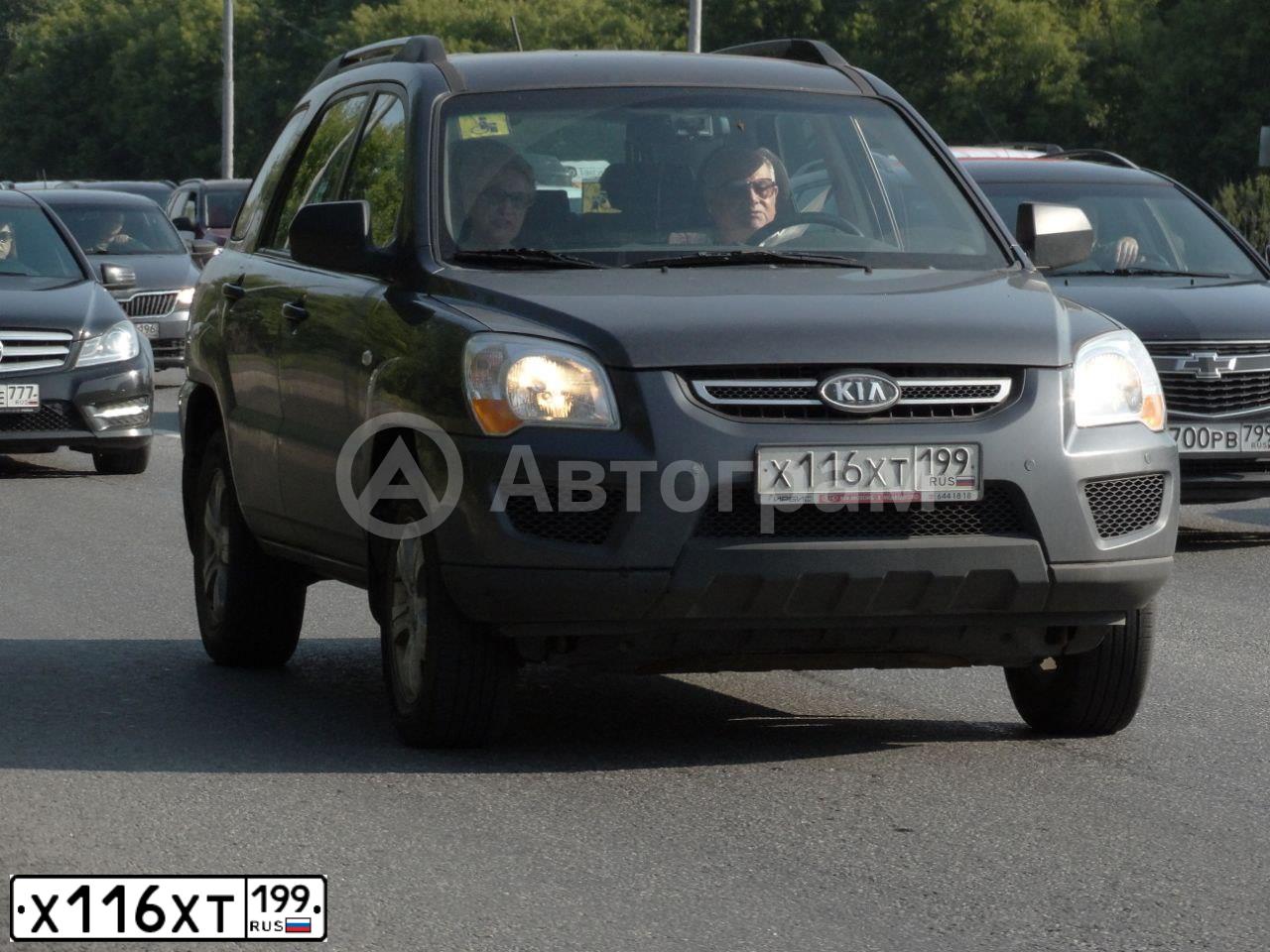 Фото автомобиля KIA SPORTAGE, 2010 — госномер Х116ХТ199. Цвет: СЕРЫЙ