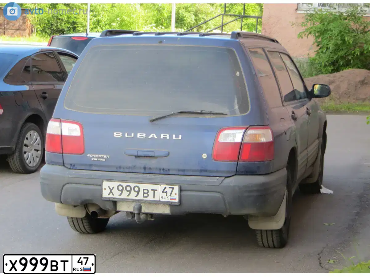 Фото автомобиля SUBARU FORESTER, 2001 — госномер К285АУ53. Цвет: синий