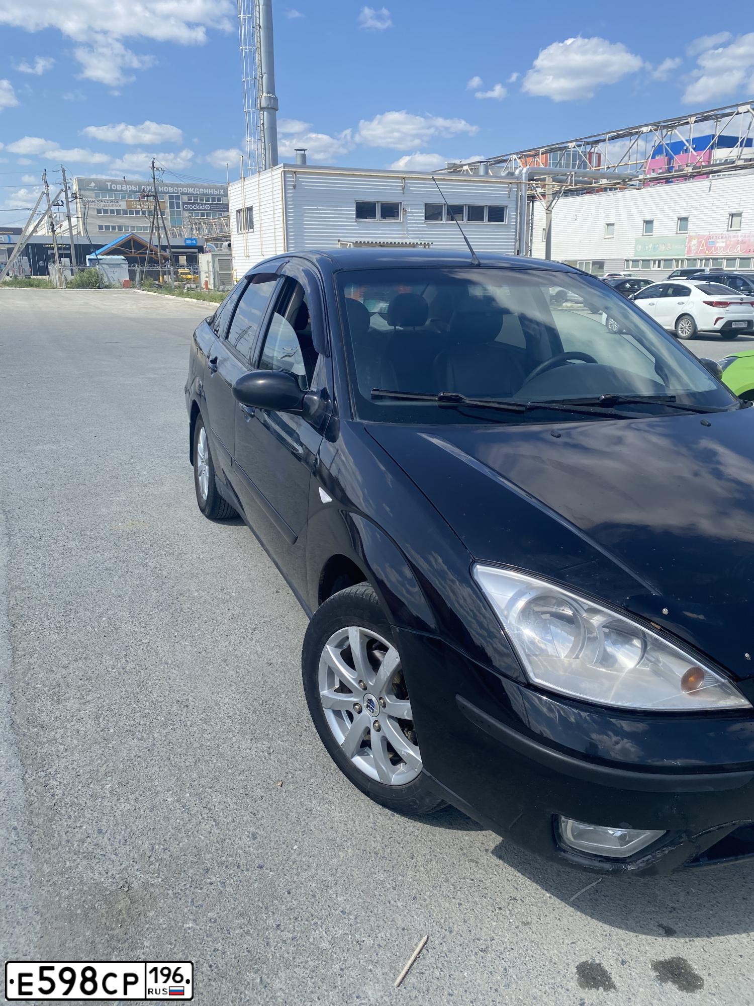 Фото автомобиля FORD FOCUS, 2005 — госномер Х175ТО196. Цвет: ЧЕРНЫЙ
