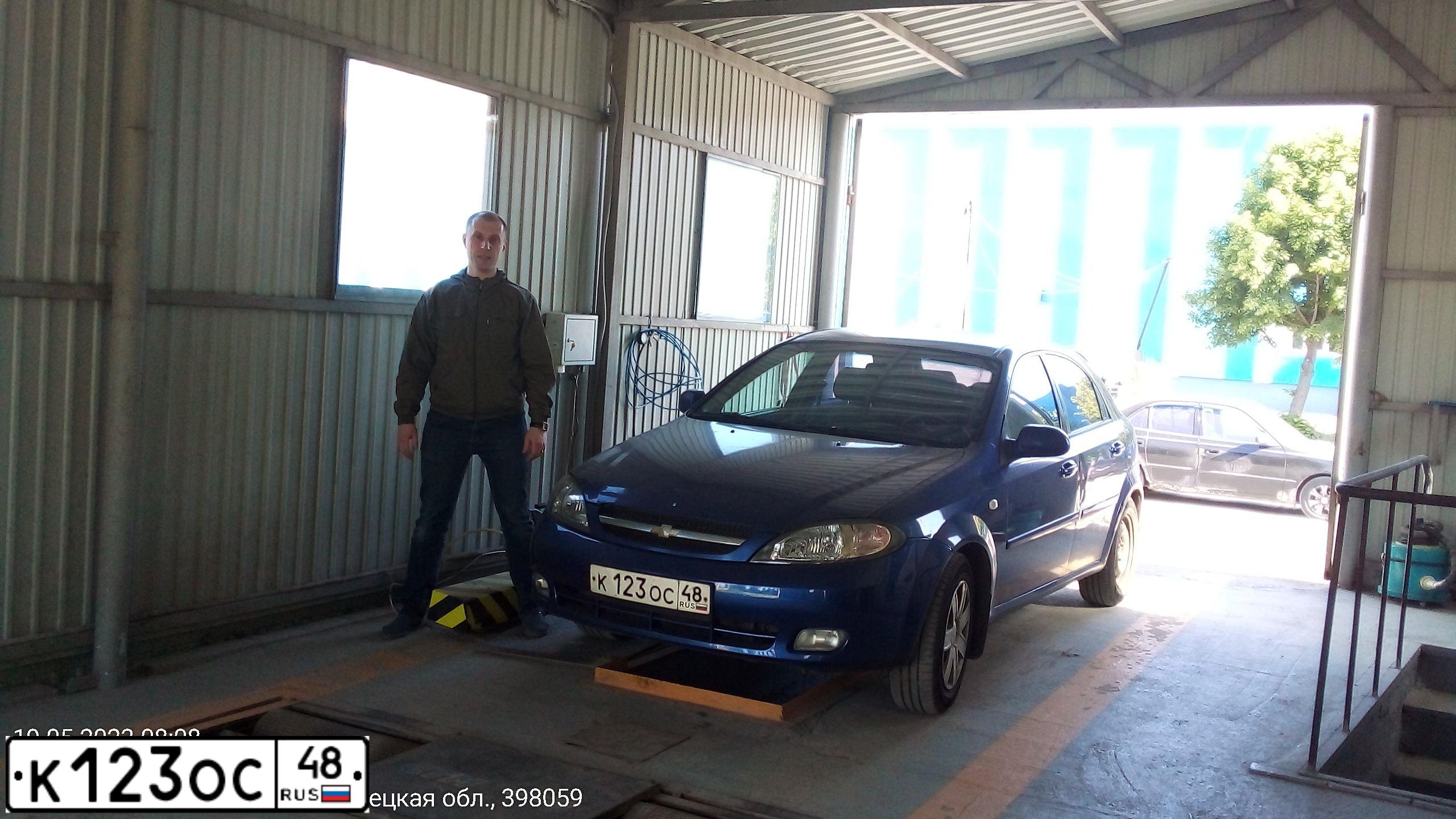 Фото автомобиля CHEVROLET LACETTI, 2008 — госномер К123ОС48. Цвет: СИНИЙ