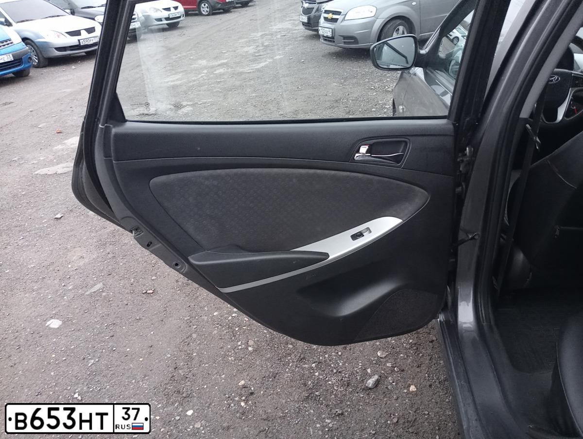 Фото автомобиля HYUNDAI SOLARIS, 2012 — госномер Е661СЕ08. Цвет: ЧЕРНО-СЕРЫЙ