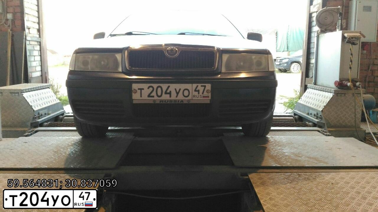Фото автомобиля SKODA OCTAVIA, 2006 — госномер Т204УО47. Цвет: Темно-синий