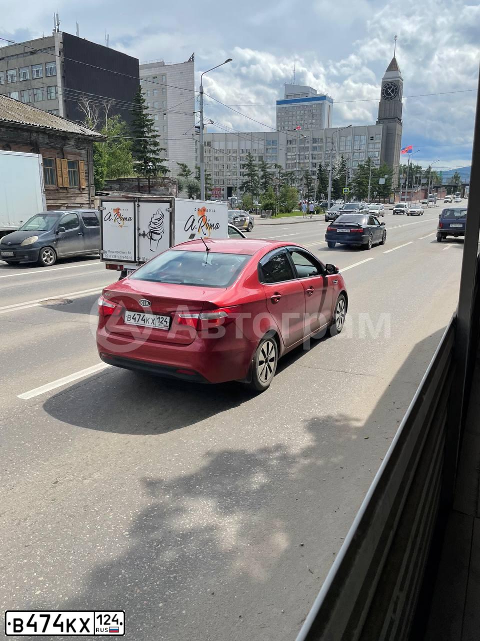 Фото автомобиля KIA RIO, 2012 — госномер В474КХ124. Цвет: КРАСНЫЙ