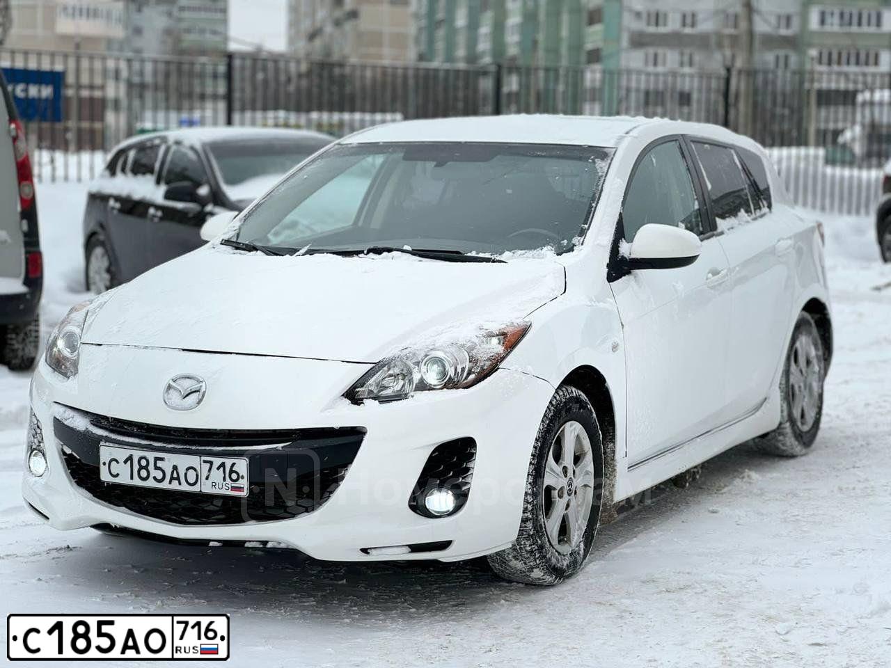 Фото автомобиля MAZDA 3, 2011 — госномер С185АО716. Цвет: Белый
