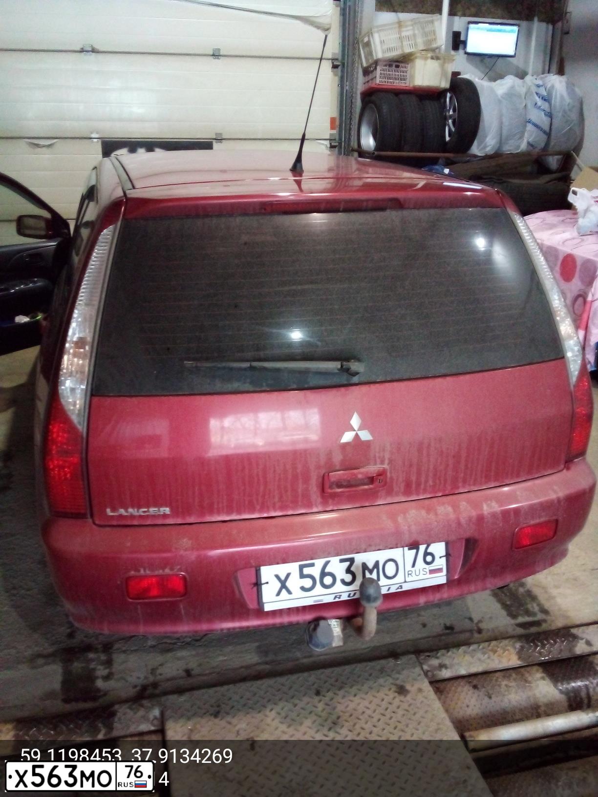 Фото автомобиля MITSUBISHI LANCER, 2008 — госномер Х676ХЕ76. Цвет: Красный