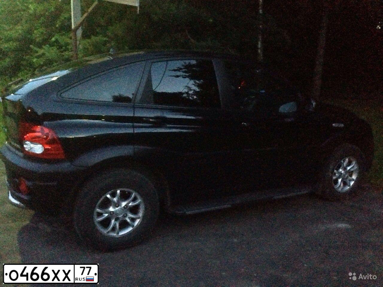 Фото автомобиля SSANGYONG MUSSO, 2007 — госномер С800РР70. Цвет: ЧЕРНЫЙ