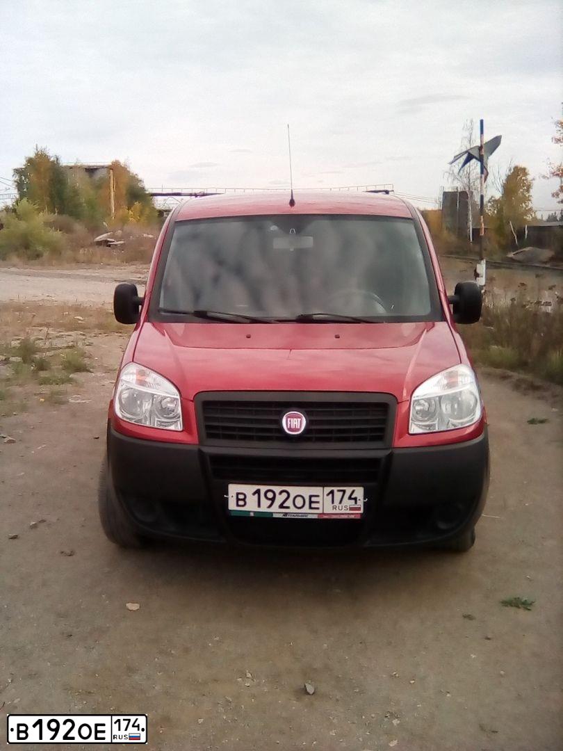 Фото автомобиля FIAT DOBLO, 2011 — госномер Н221НС196. Цвет: КРАСНЫЙ СЦИЛЛА