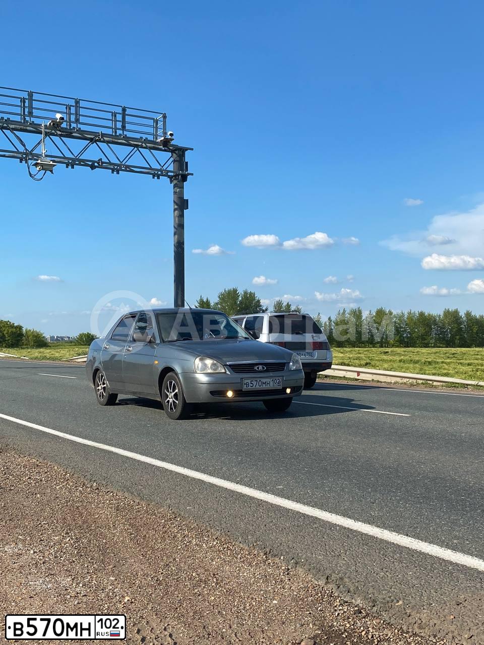 Фото автомобиля LADA 2170 PRIORA, 2010 — госномер В570МН102. Цвет: СРЕДНИЙ СЕРО-ЗЕЛЕНЫЙ МЕТ.