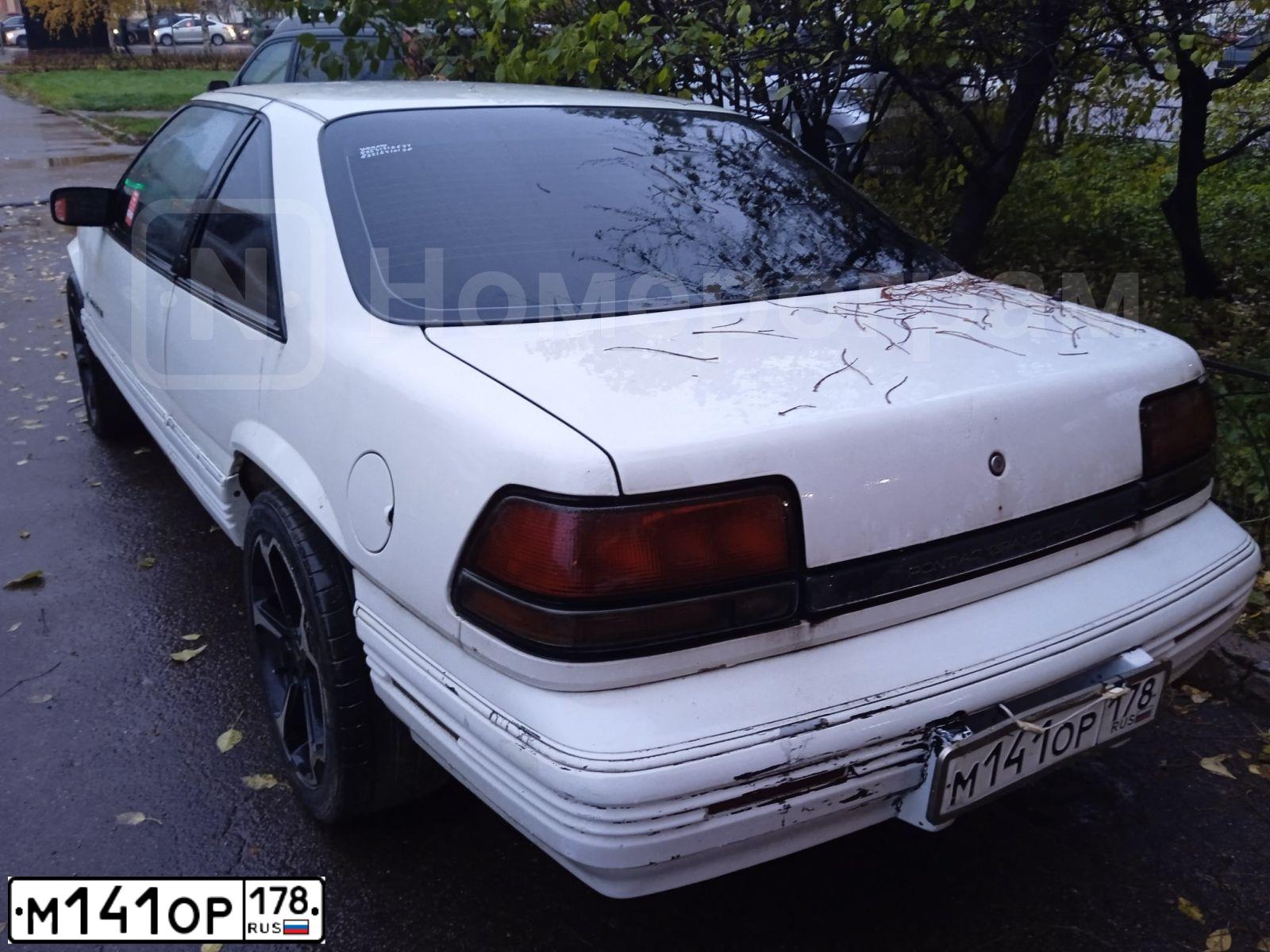 Фото автомобиля PONTIAC GRAND PRIX, 1994 — госномер М141ОР178. Цвет: Белый
