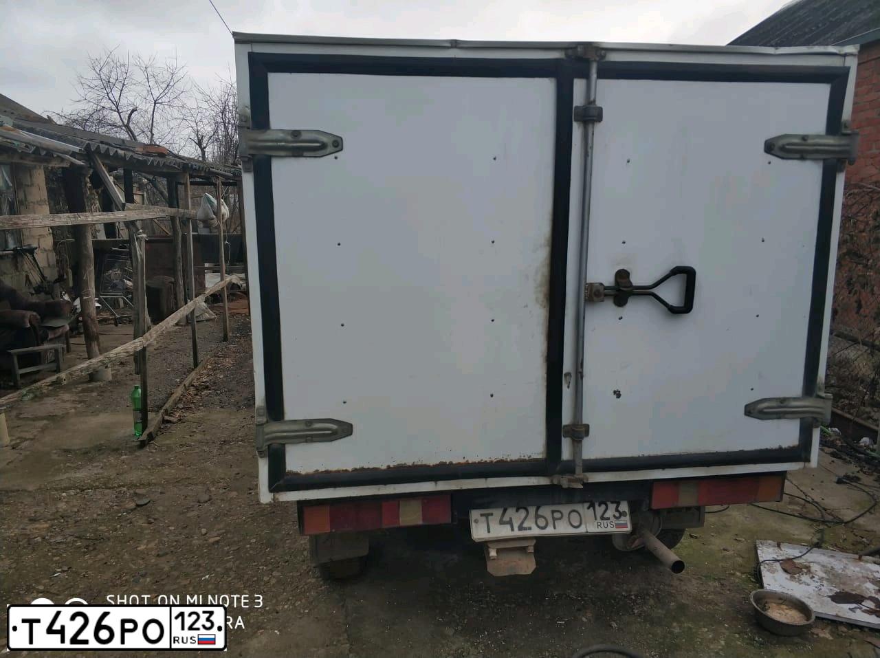 Фото автомобиля LADA 2345 WIS, 2005 — госномер О020ОР123. Цвет: ЯРКО-БЕЛЫЙ