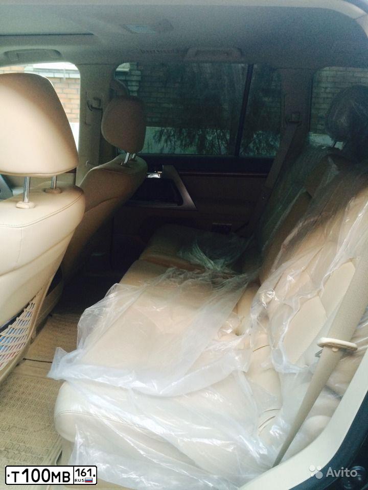 Фото автомобиля TOYOTA LANDCRUISER 200, 2013 — госномер Т100МВ161. Цвет: ЧЕРНЫЙ