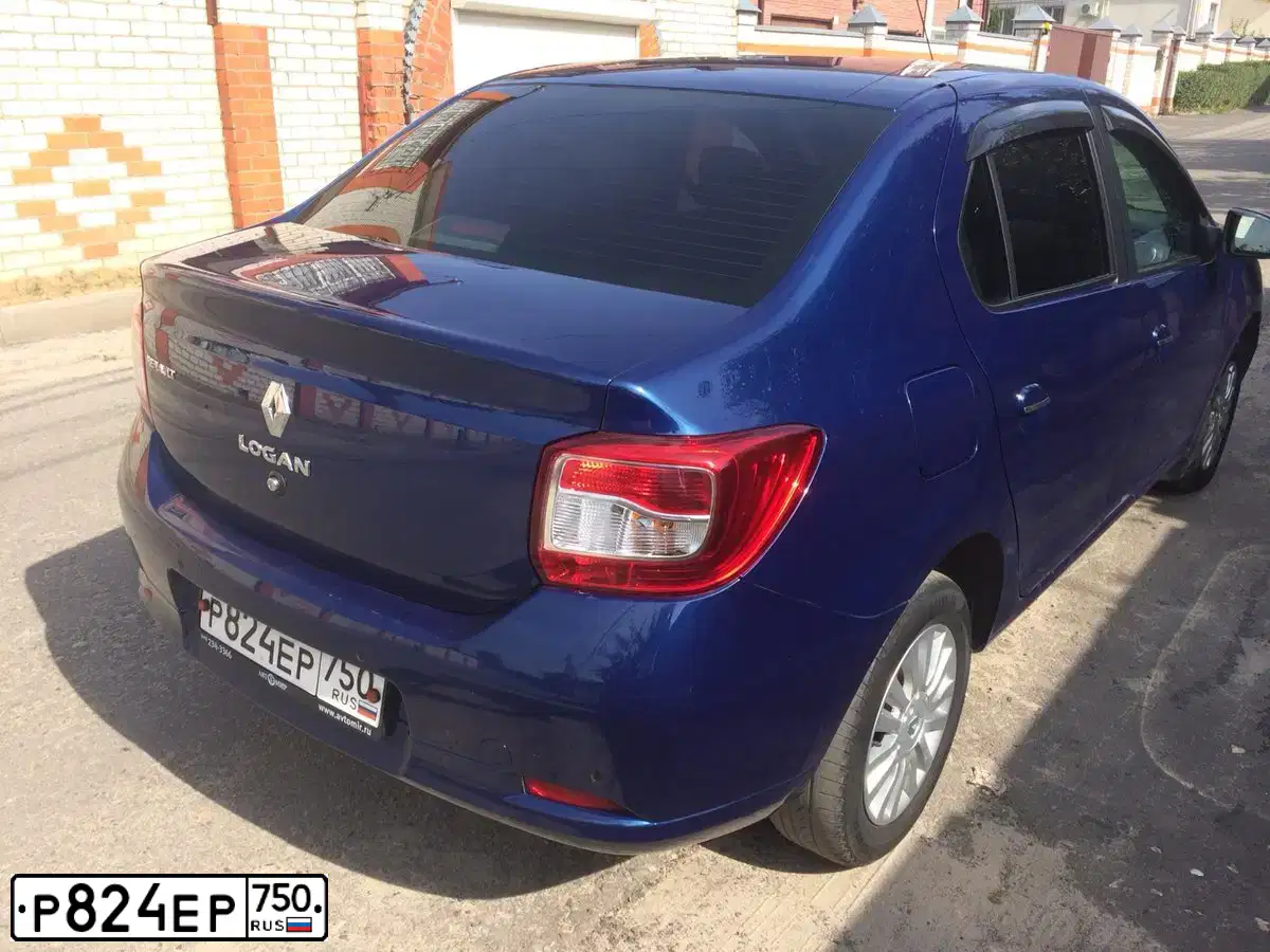 Фото автомобиля RENAULT LOGAN, 2014 — госномер Х512КР57. Цвет: СИНИЙ