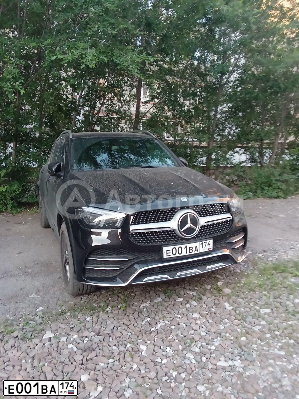 Фото автомобиля BMW X6, 2022 — госномер Е001ВА174. Цвет: Белый