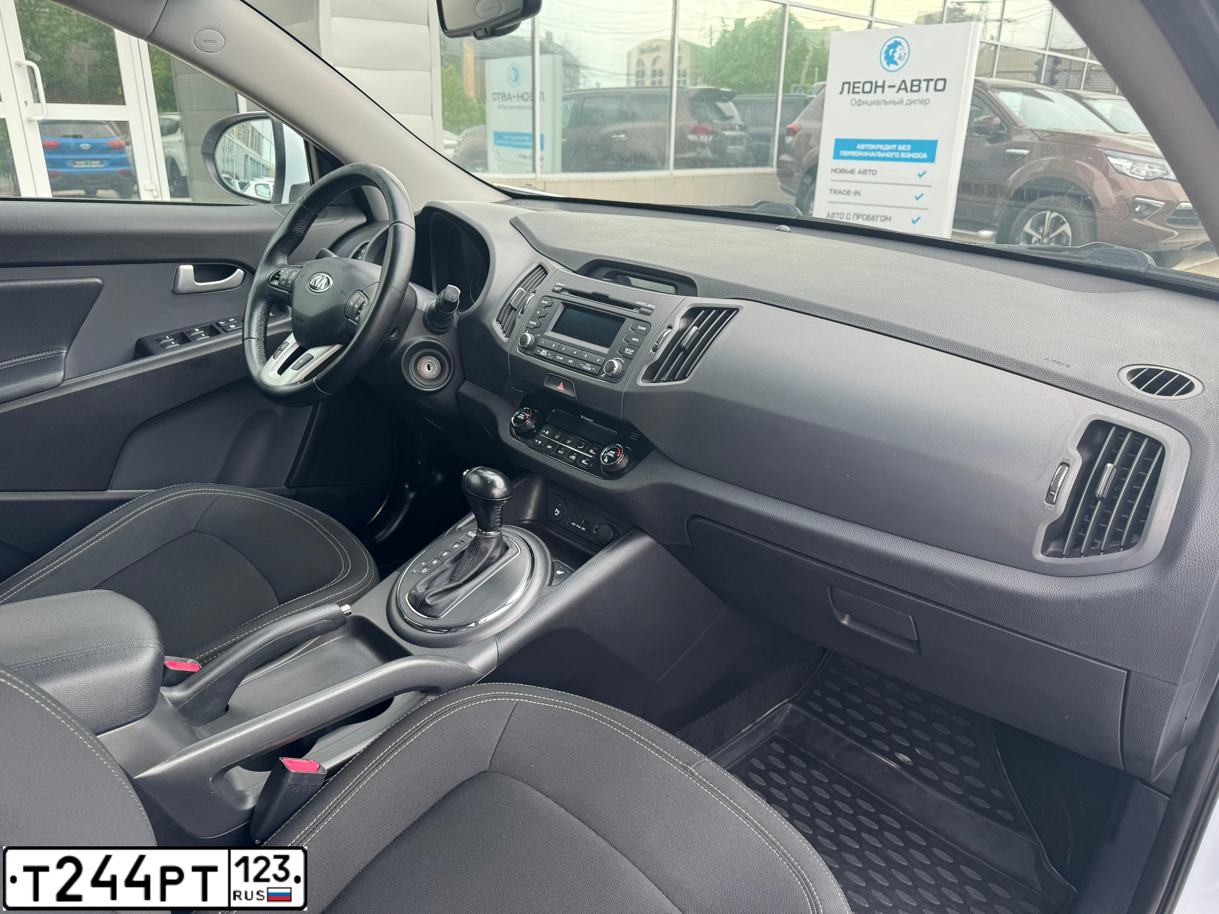 Фото автомобиля KIA SPORTAGE, 2012 — госномер Т244РТ123. Цвет: Белый