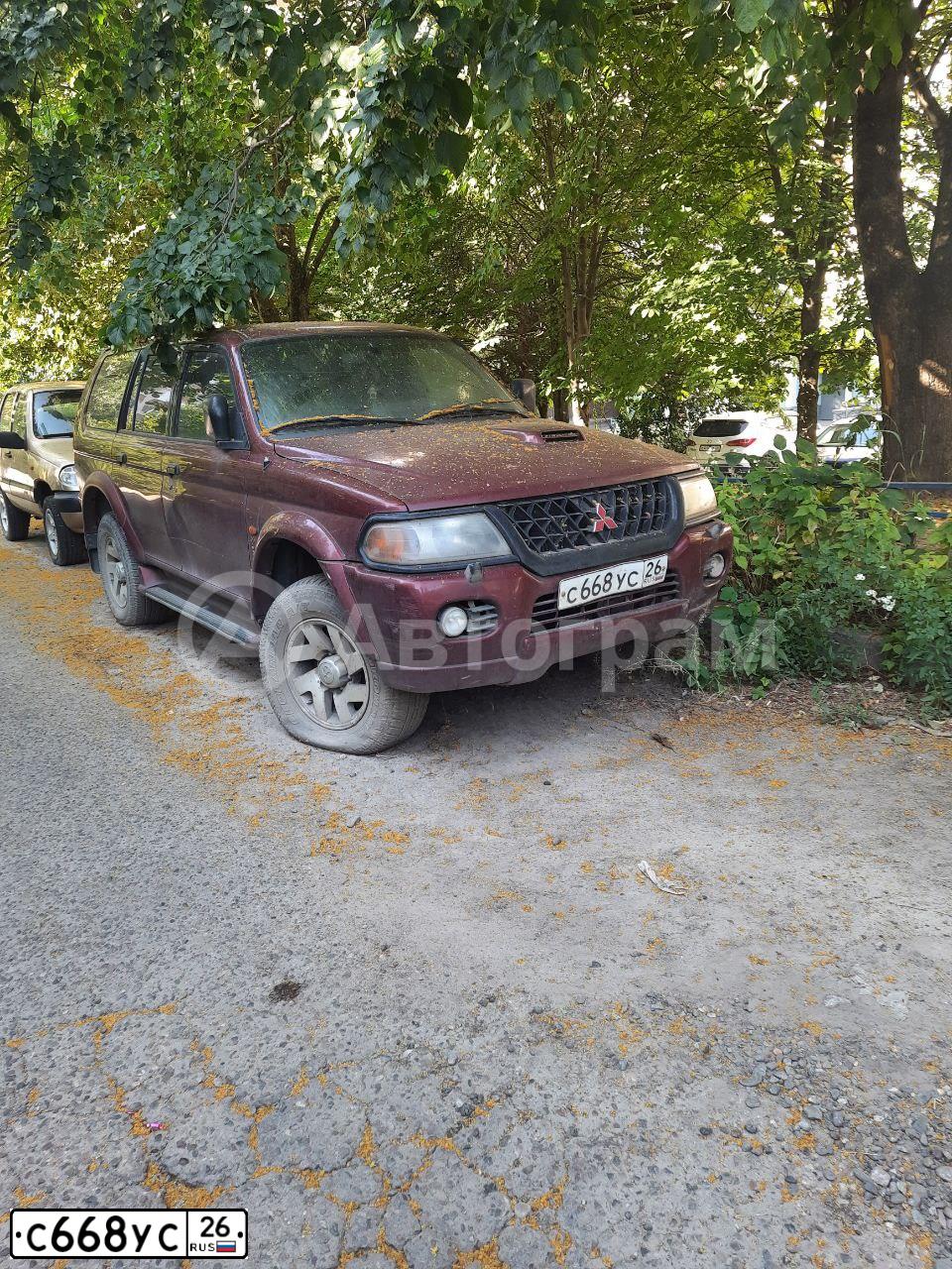 Фото автомобиля MITSUBISHI МIТSUВISНI РАJЕRО SРОRТ, 2000 — госномер С668УС26. Цвет: БОРДОВЫЙ