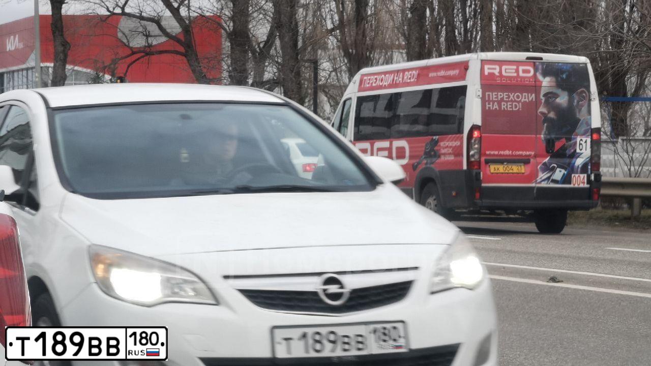 Фото автомобиля OPEL ASTRA, 2011 — госномер Т189ВВ180. Цвет: Белый