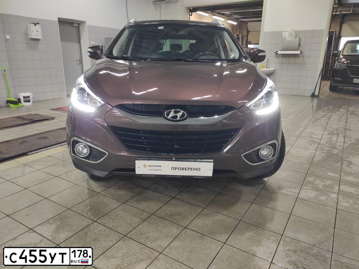 Фото автомобиля HYUNDAI IX35, 2014 — госномер К422СТ198. Цвет: Коричневый