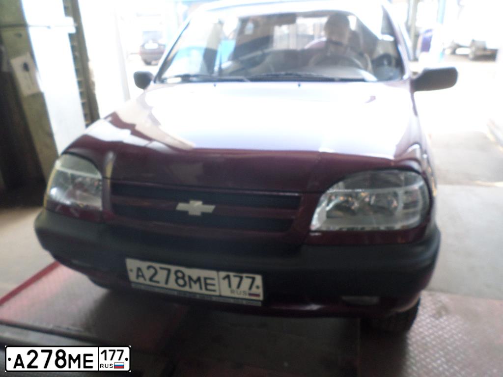 Фото автомобиля CHEVROLET NIVA, 2006 — госномер А278МЕ177. Цвет: СЕРЕБРИСТЫЙ ЯРКО-КРАСНЫЙ