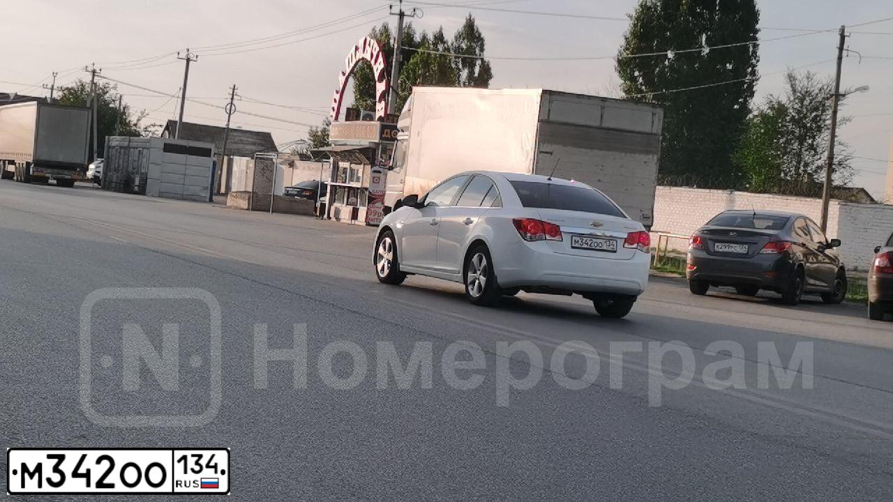 Фото автомобиля CHEVROLET CRUZE, 2011 — госномер С333УХ34. Цвет: Белый