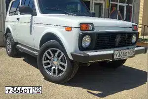 Фото автомобиля LADA 2121 NIVA, 2015 — госномер К045СР126. Цвет: Белый