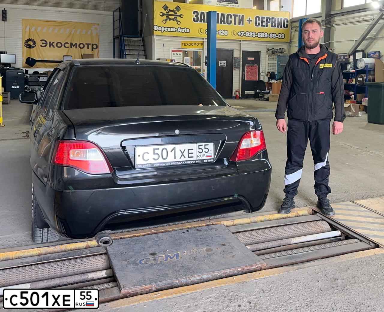 Фото автомобиля DAEWOO O NEXIA, 2009 — госномер С501ХЕ55. Цвет: КОРАЛЛОВО-ЧЕРНЫЙ
