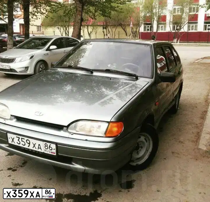 Фото автомобиля LADA 2114 SAMARA, 2007 — госномер Х359ХА86. Цвет: СЕРЫЙ