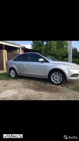 Фото автомобиля FORD FOCUS, 2009 — госномер Е476АС76. Цвет: СЕРЫЙ