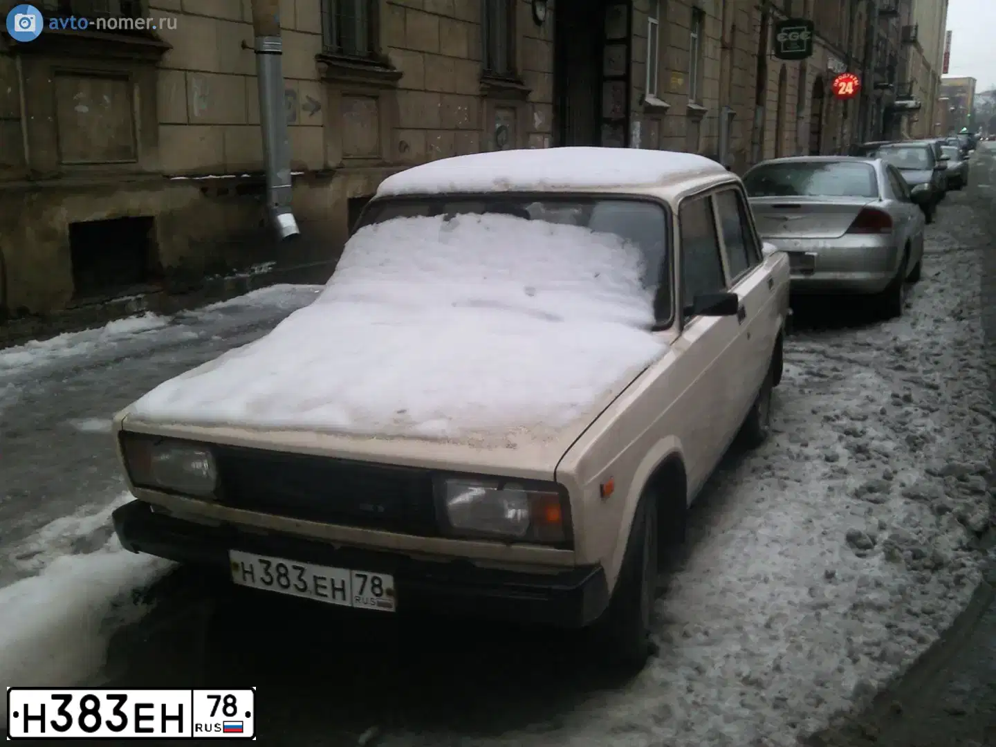 Фото автомобиля LADA 2192 KALINA, 2015 — госномер Н383ЕН78. Цвет: ЧЕРНЫЙ