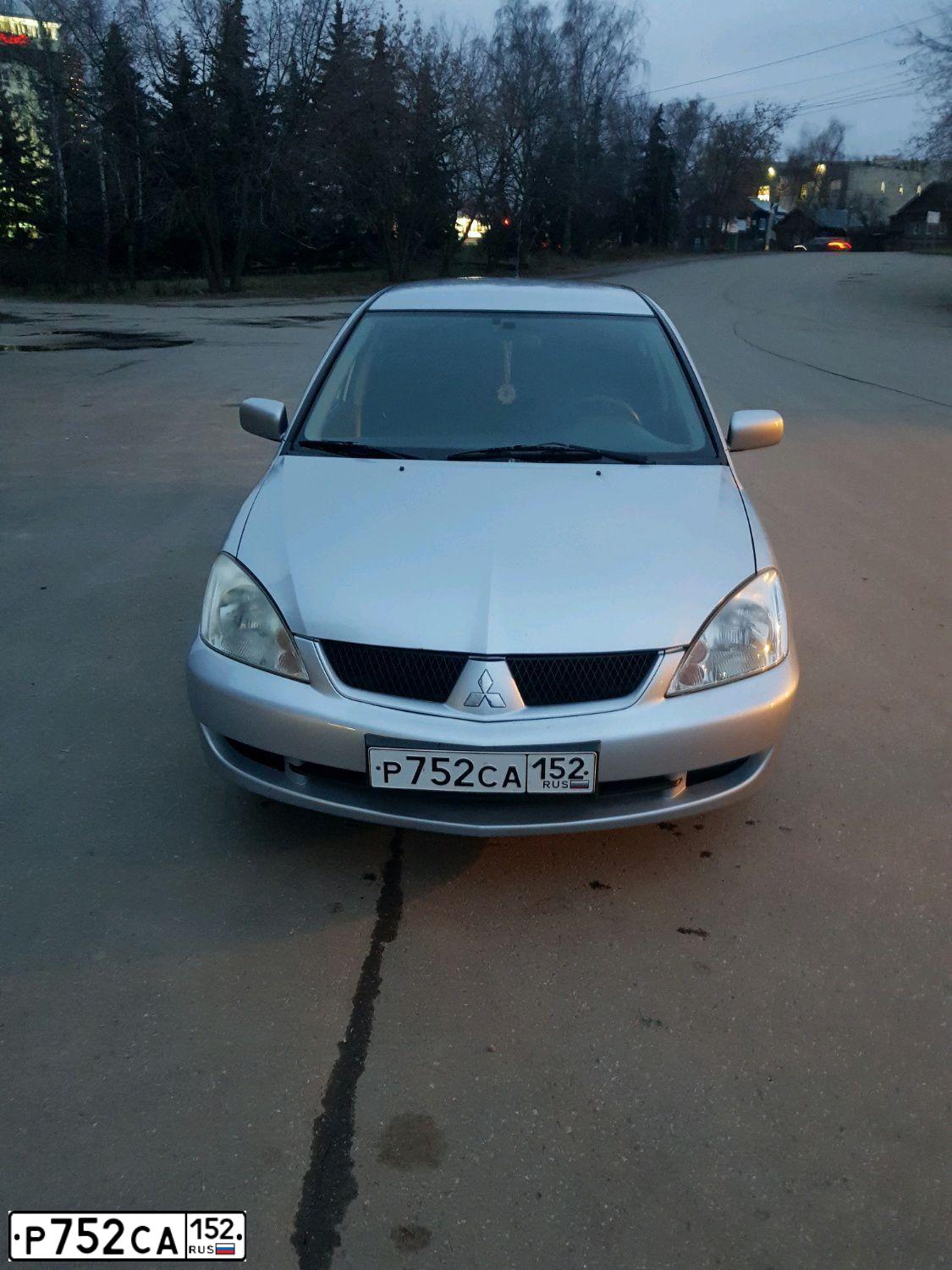 Фото автомобиля MITSUBISHI LANCER, 2006 — госномер Р752СА152. Цвет: СВЕТЛО-СЕРЫЙ
