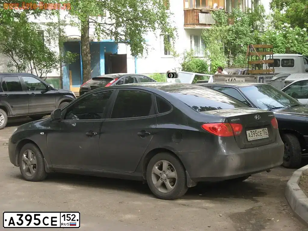 Фото автомобиля HYUNDAI ELANTRA, 2009 — госномер А395СЕ152. Цвет: ЧЕРНЫЙ